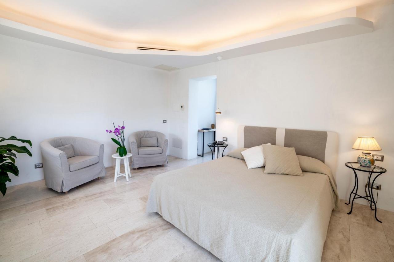 Hotel Grand Relais Dei Nuraghi Baja Sardinia Bagian luar foto